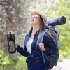 64oz glass sports water bottle with motivational time marker, straw, silicone sleeve, handle, and hydration tracker