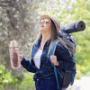 64oz glass sports water bottle with motivational time marker, straw, silicone sleeve, handle, and hydration tracker