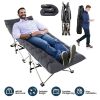 Portable folding camping cot with soft double-sided pad, supports up to 440 lbs
