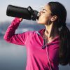 64oz glass sports water bottle with motivational time marker, straw, silicone sleeve, handle, and hydration tracker