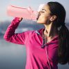 64oz glass sports water bottle with motivational time marker, straw, silicone sleeve, handle, and hydration tracker