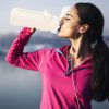 64oz glass sports water bottle with motivational time marker, straw, silicone sleeve, handle, and hydration tracker